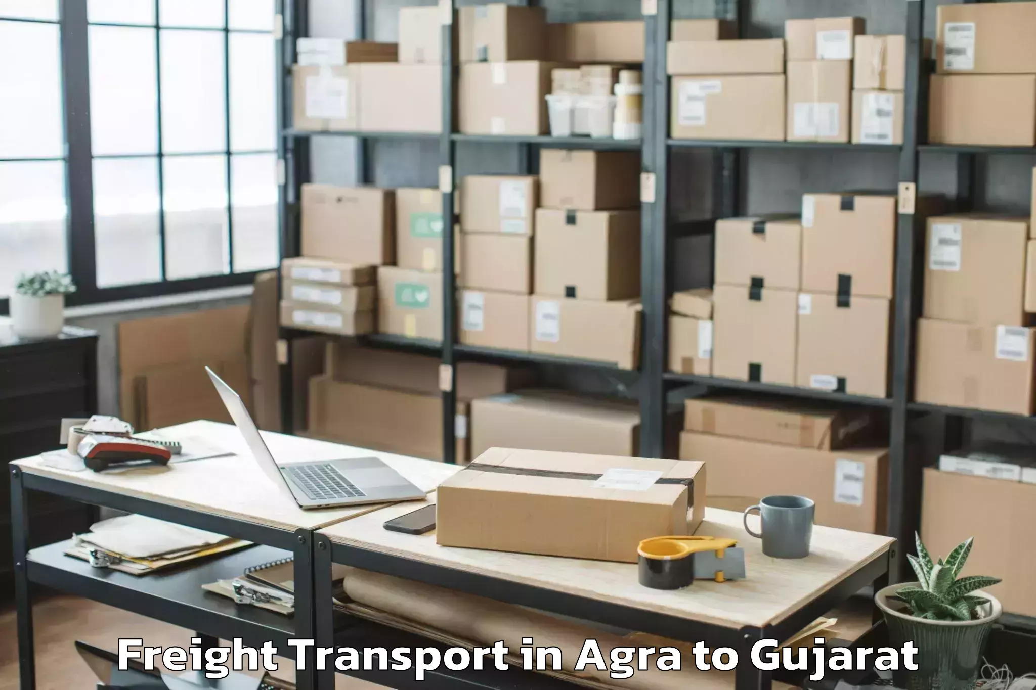 Book Agra to Songadh Freight Transport Online